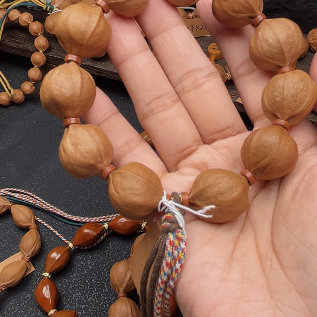 0***0橄榄核手串20.22梅林铁核