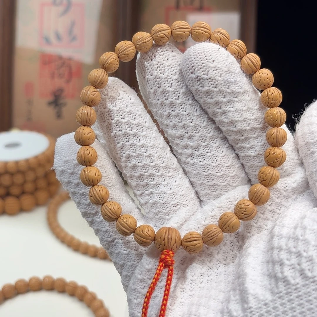 桃核手串0.8加「三道筋小奶豆」