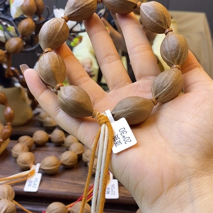 ヾ***メ橄榄核吊坠梅林铁核