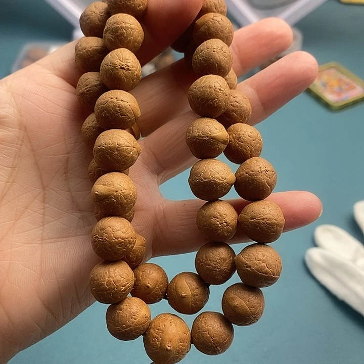 凤眼菩提吊坠13mm36手持