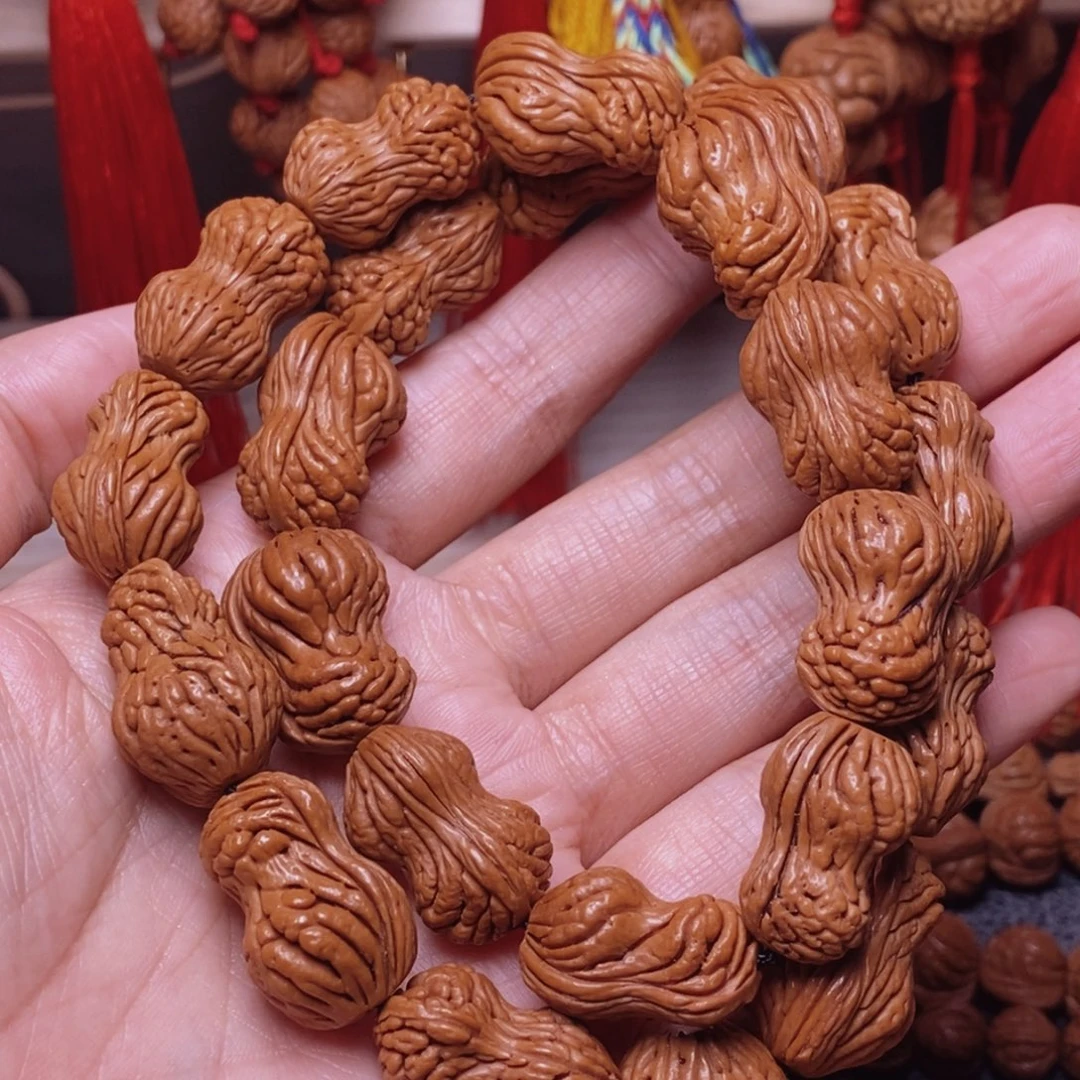 桃核吊坠桃枭手持