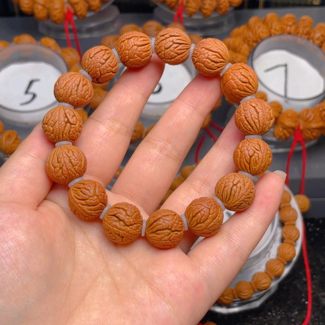 学***己桃核吊坠叶叶叶叶叶