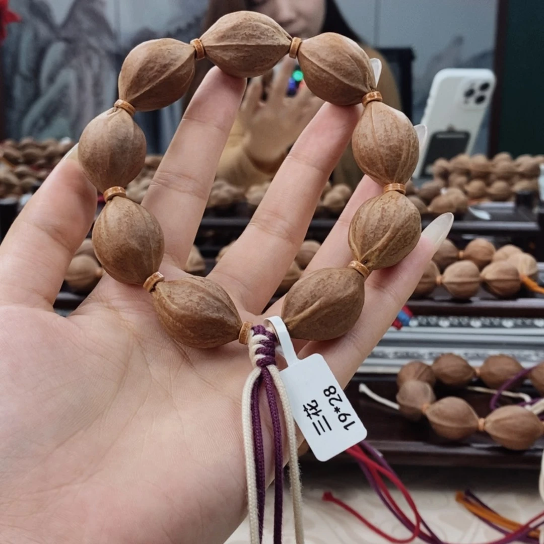 橄榄核吊坠理**旬原生态正宗梅林铁核
