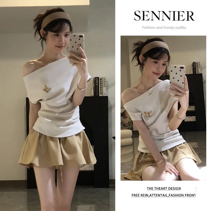 夏季温柔系穿搭女2025新款韩版时尚斜肩收腰上衣百搭短裙两件套装