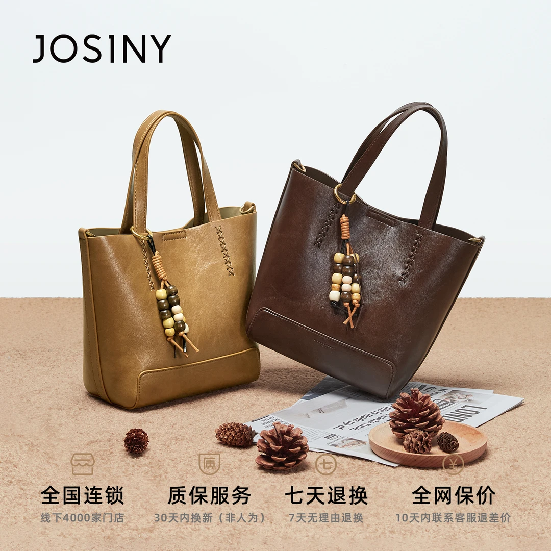 卓诗尼2025秋冬斜挎式防水轻奢黑色软面单肩包水桶包单肩便捷棕色