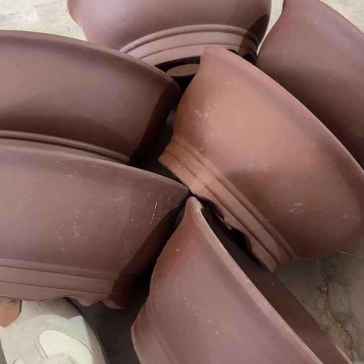 紫砂花盆100-6。          27-12