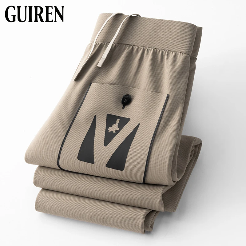 春夏时尚百搭运动裤子冰丝空气层太空棉男士修身小脚卫裤休闲裤