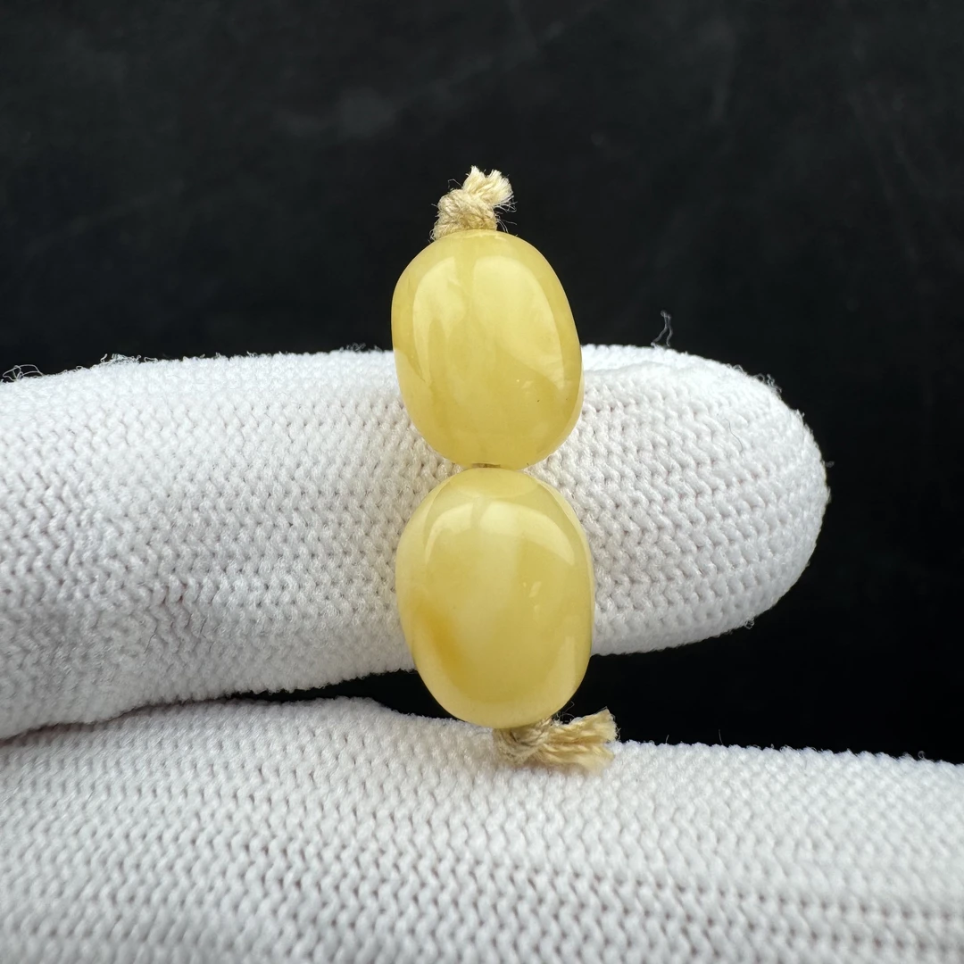 K2663天然原矿蜜蜡 对珠9.2mm支持鉴定 假一罚十