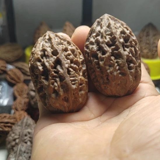 乌***拉文玩核桃把件梭子