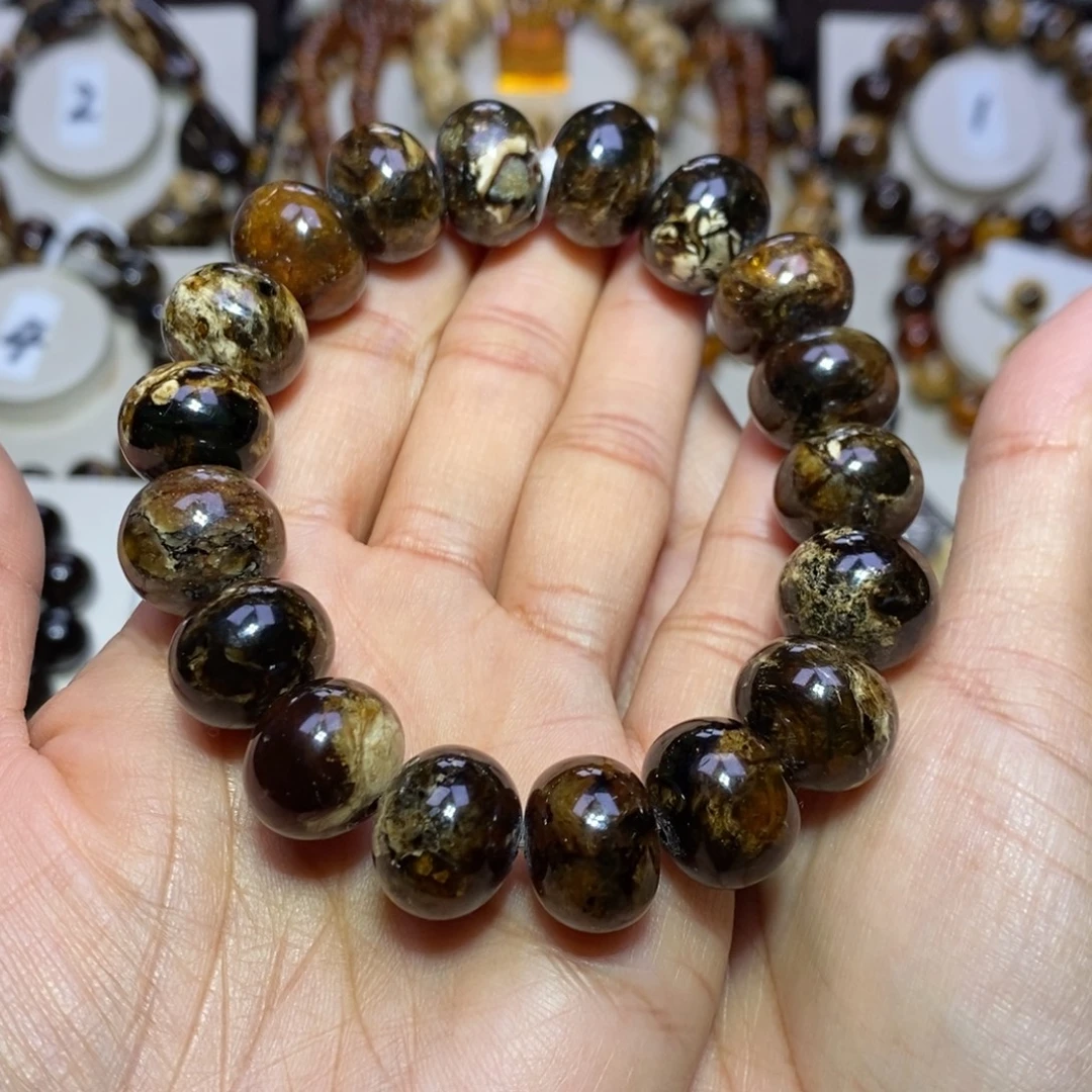 【***陽琥珀未镶嵌裸石熊猫花15+