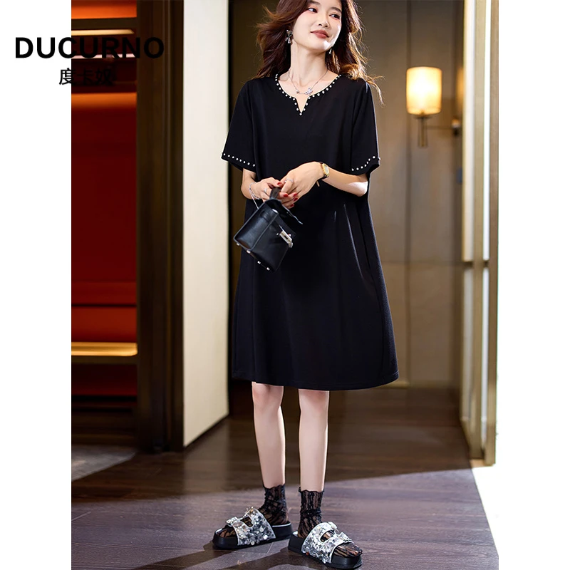 气质重工钉钻黑色连衣裙女秋季2025年新款宽松大码裙子时尚a字裙