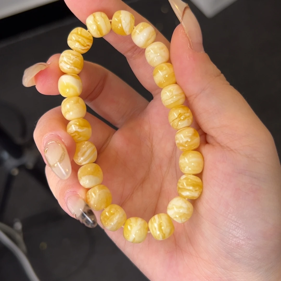 琥珀未镶嵌手串金瓷白虎皮千层9.5m