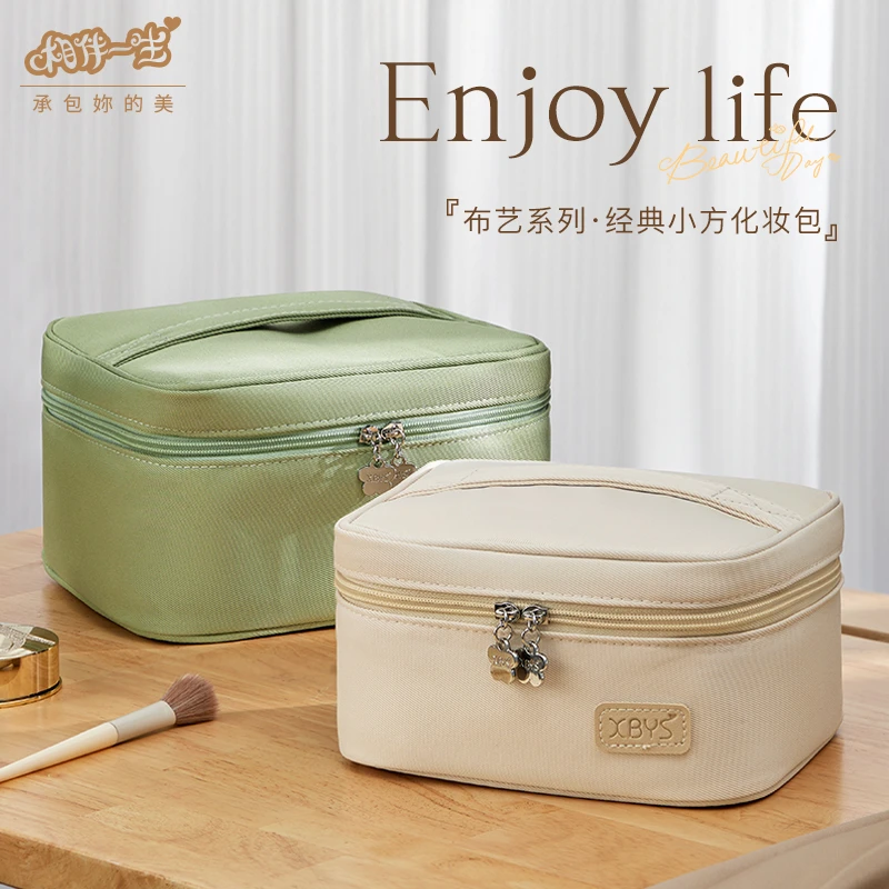 化妆包女大容量旅行2025新款手提包化妆品收纳包便携随身洗漱包