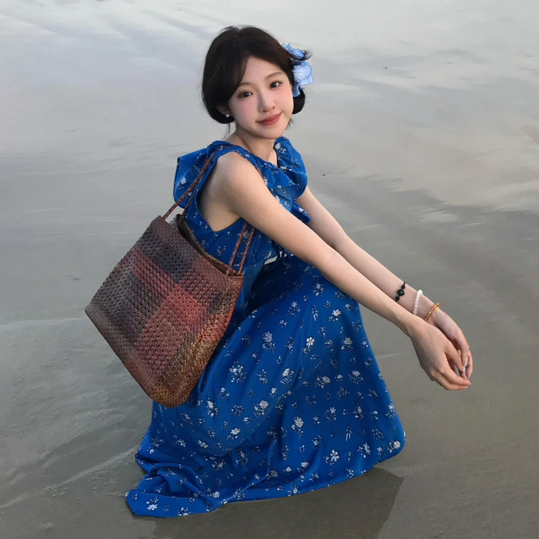 法式气质蓝色碎花吊带连衣裙子女夏季2025新款海边度假高级感长裙
