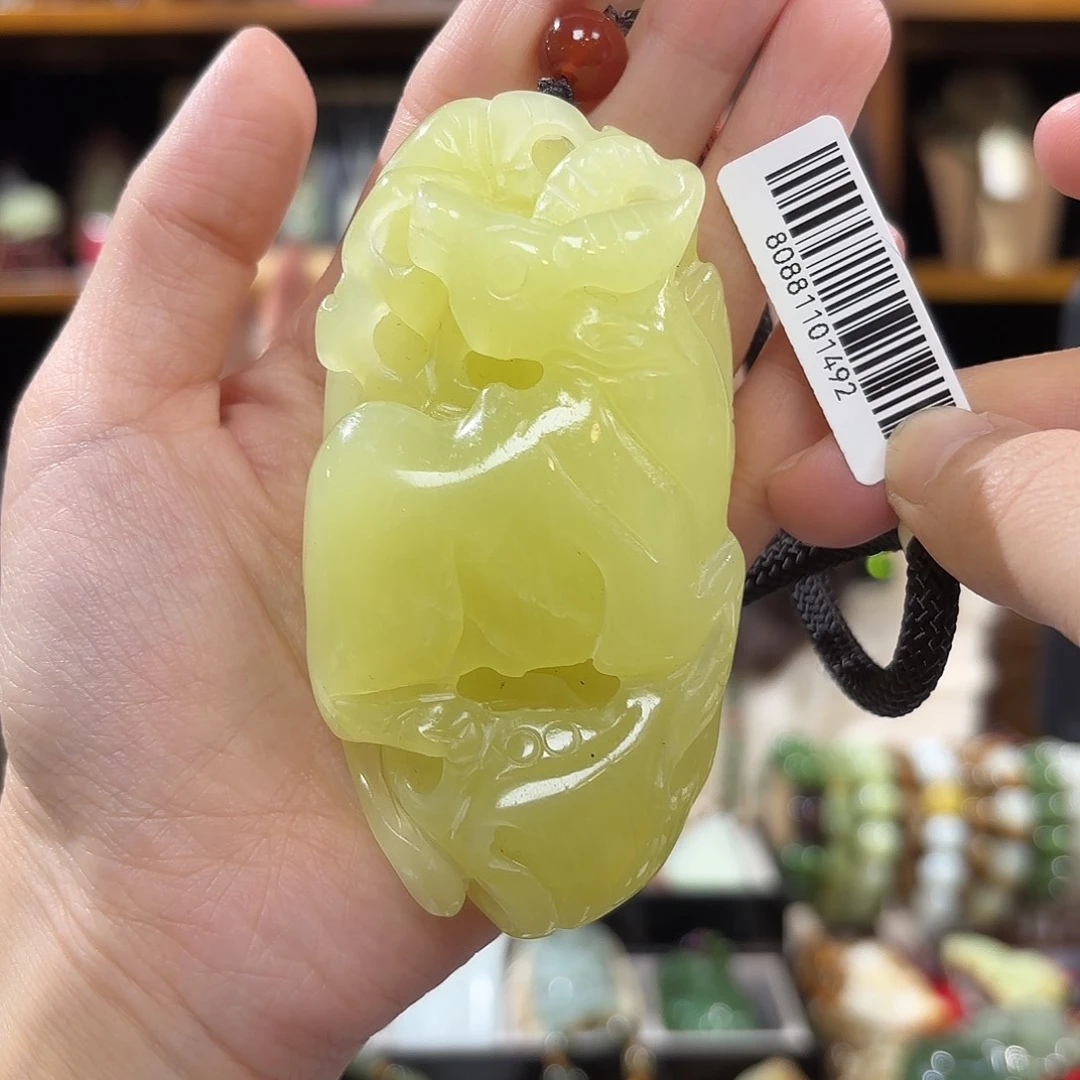 岫玉牛手把件未镶嵌