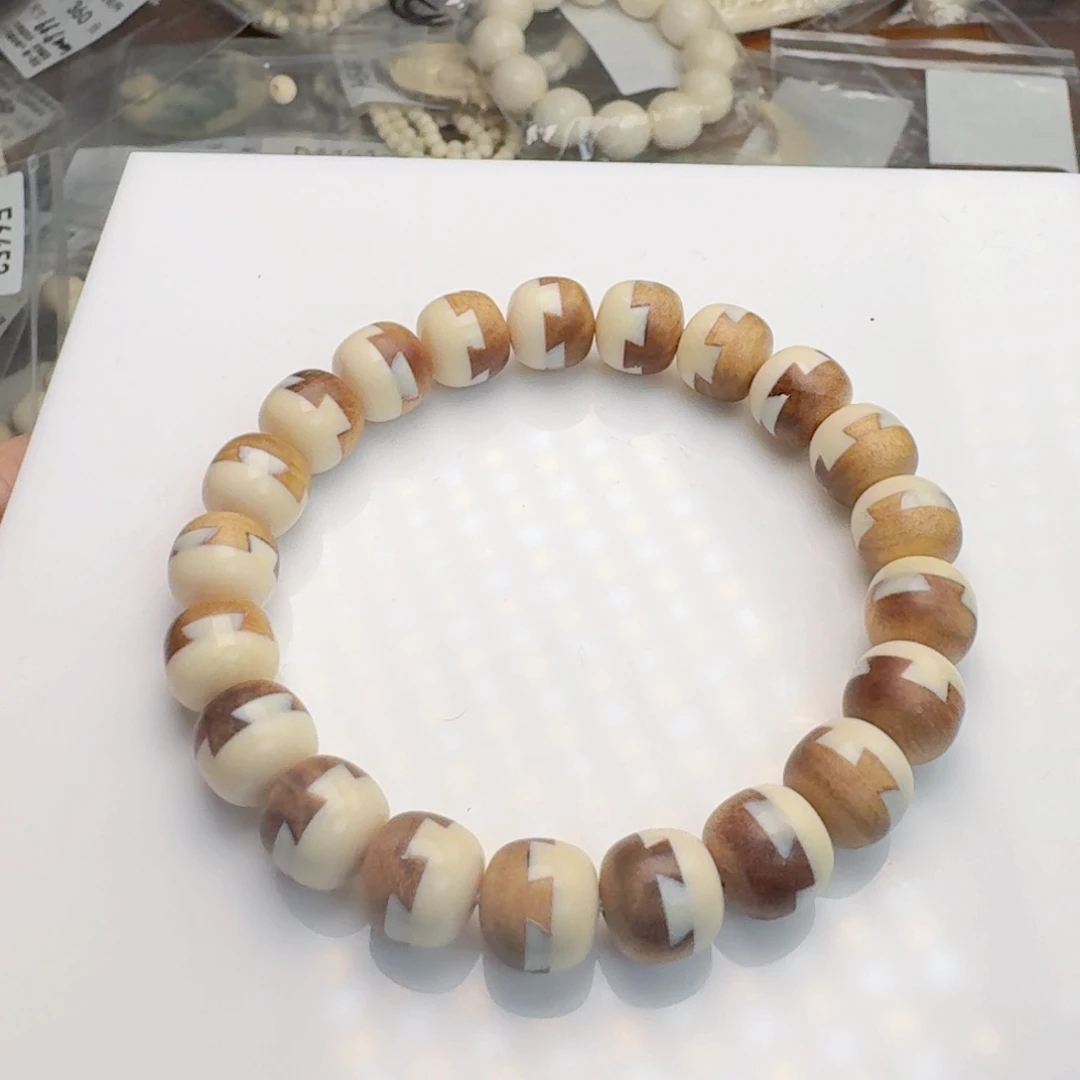 柏香籽/百香籽吊坠那*。猛犸