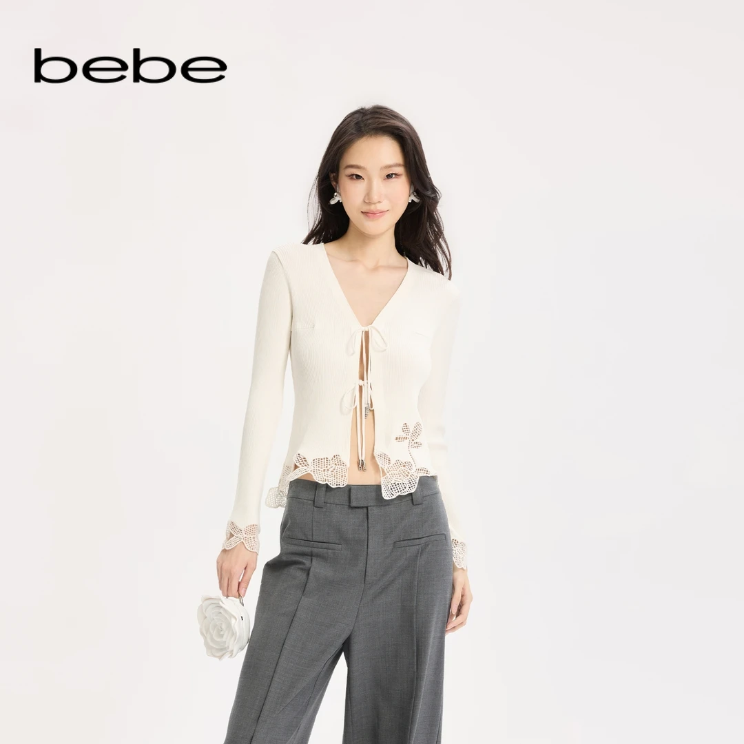 bebe2025秋季新款女士深V领花朵镂空蝴蝶结绑带针织上衣330608