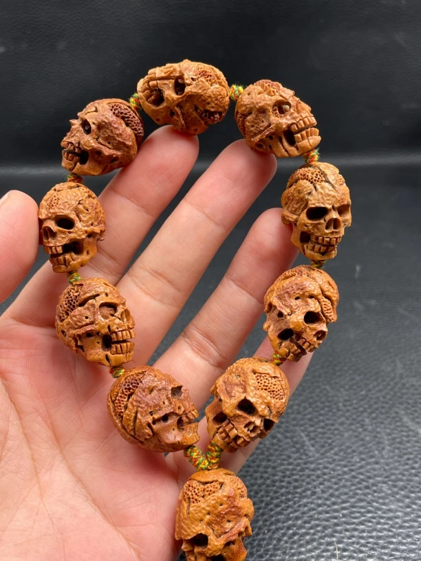 桃核纯手工雕刻1.8骷髅灵主手串