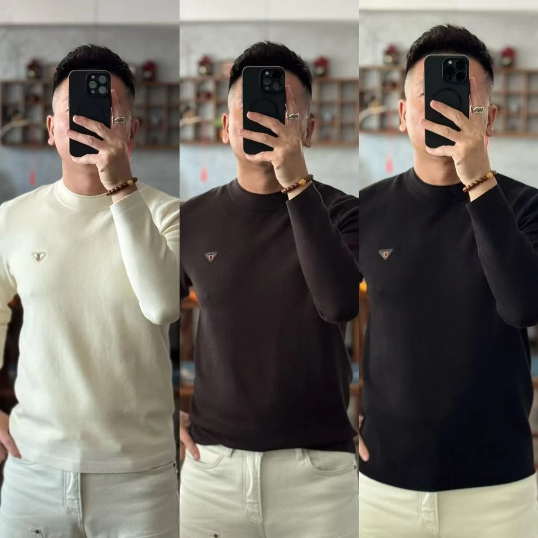 66512欧货冬季时尚简约桑蚕丝混纺圆领三角标拼接撞色男士针织衫