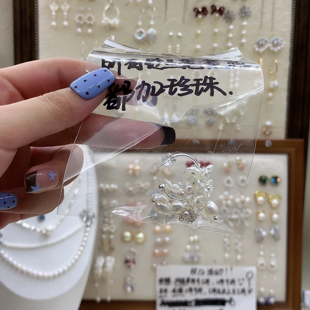 淡水珍珠银S925镶嵌耳饰