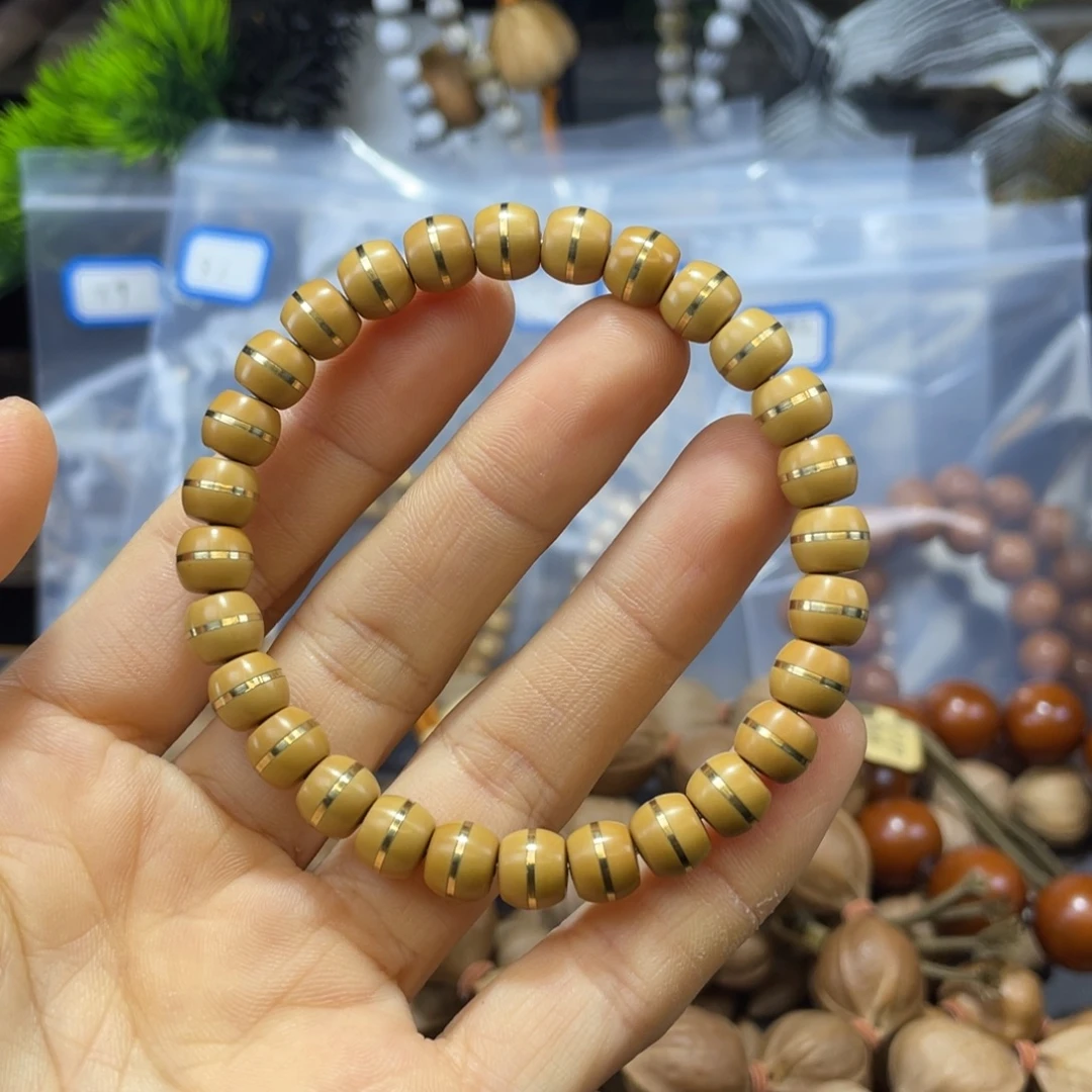 小***明橄榄核吊坠8.2核尖