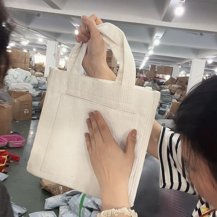 美丽诺羊毛三醋酯纤维白色灯芯绒面料手提包