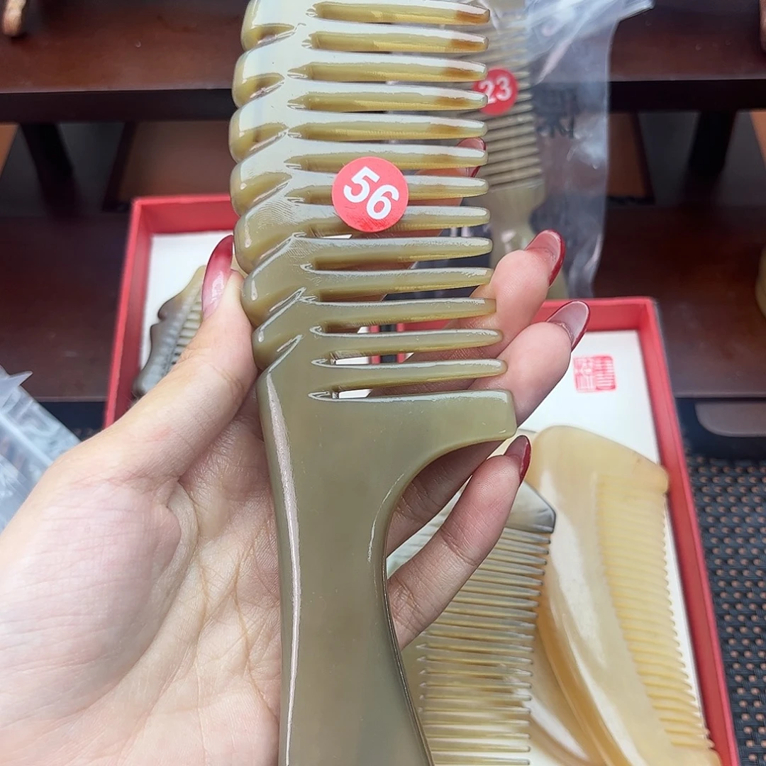 豆***豆纯手工制作纯牛角梳子