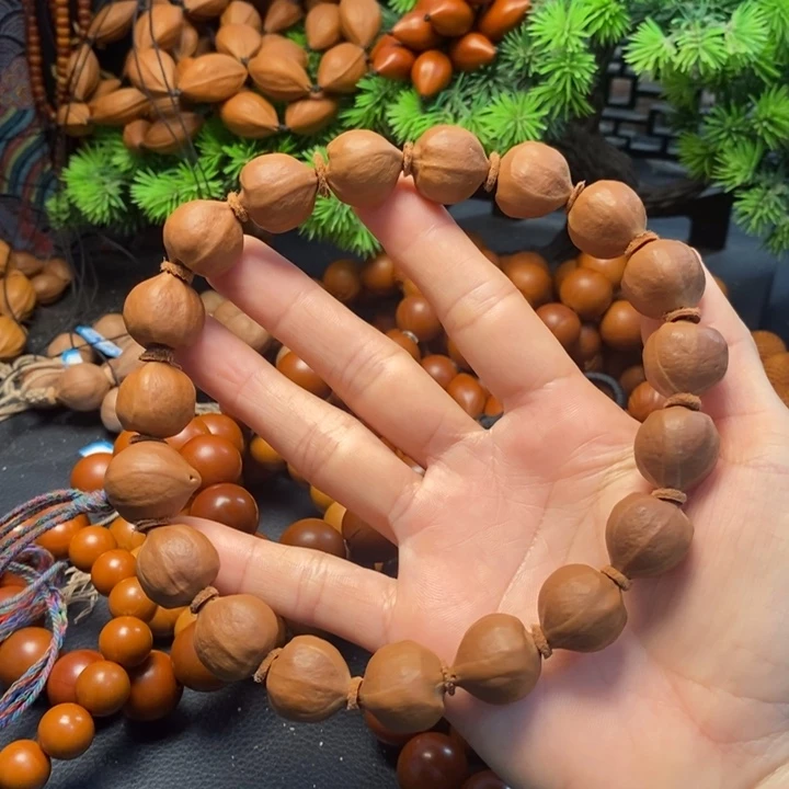 橄榄核手串1.7*1.9蜜桃臀