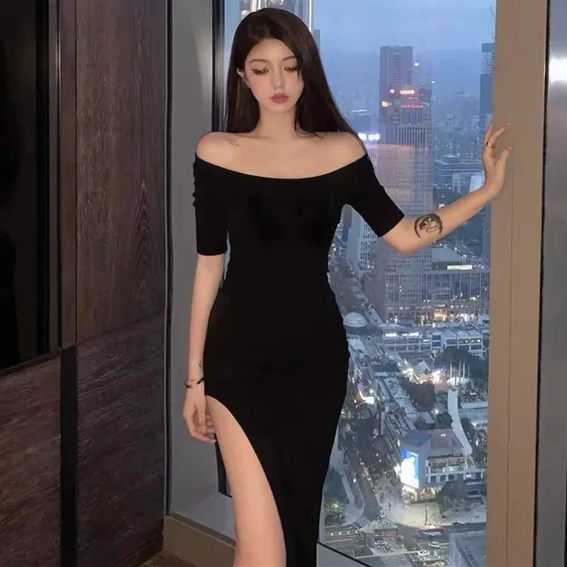一字肩黑色性感短袖夏季掐腰连衣裙露锁骨显瘦过膝开叉包臀长裙子