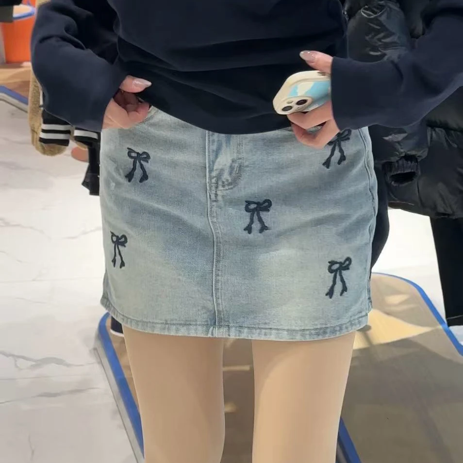 蝴蝶结刺绣牛仔a字裙女2025春季新款时尚高腰显瘦百搭遮胯半身裙