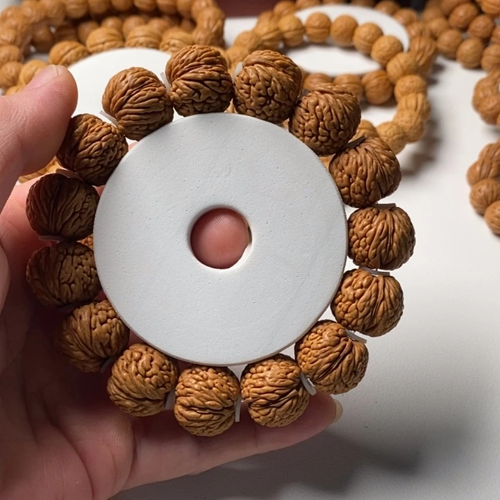 趙***名吊坠桃核精品桃核手串龙鳞