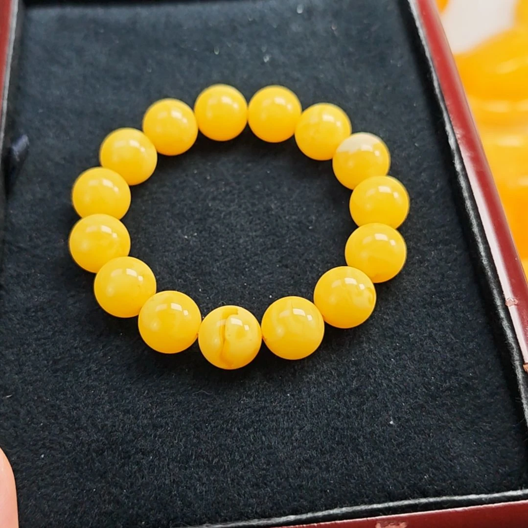 手串蜜蜡未镶嵌同料手串14m。