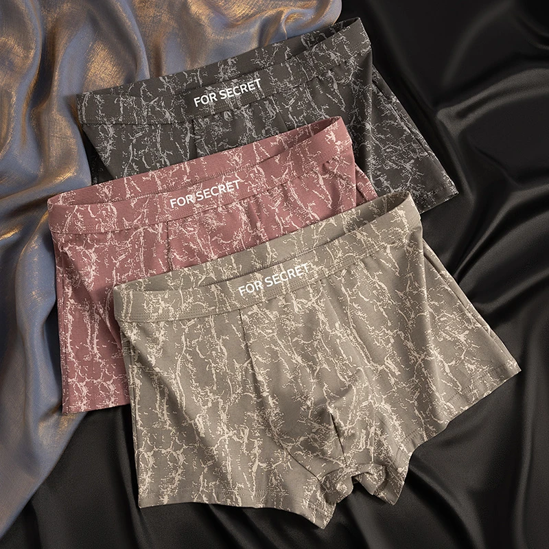 新款男士内裤男纯棉平角裤舒适简约青少年四角裤头印花男生短裤衩