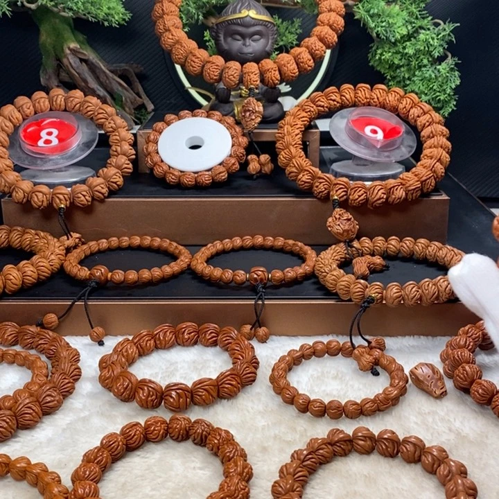 桃核吊坠找***名秦岭龙纹