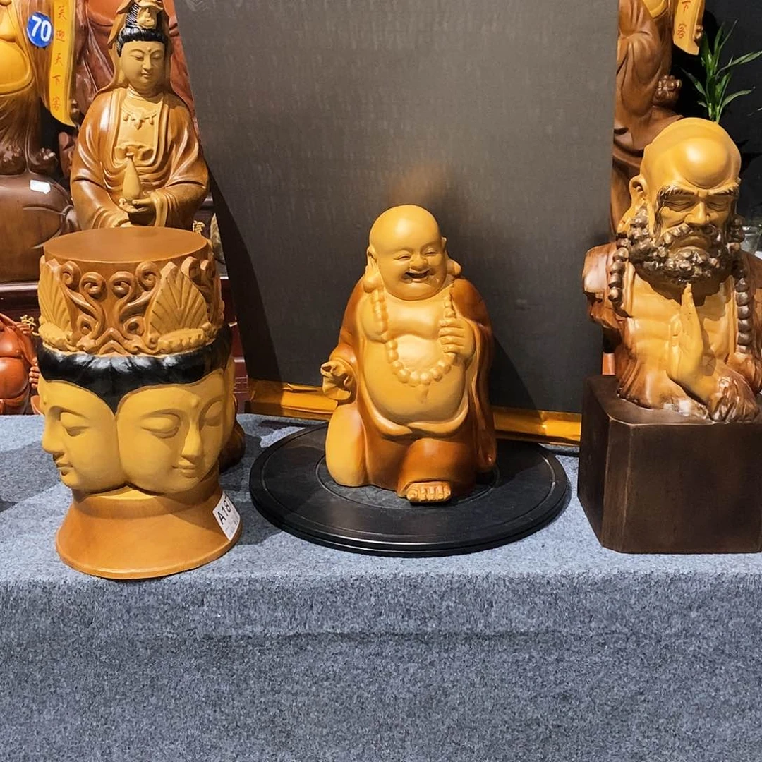 香樟木小*哥木制工艺品摆件