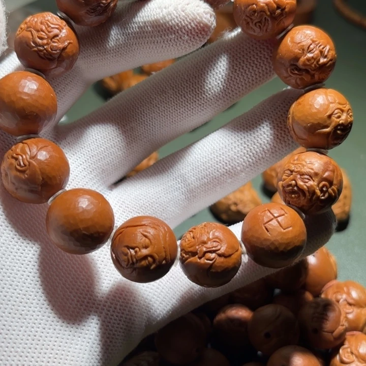 橄榄核手串/手链時****心手工罗汉有色差，特价