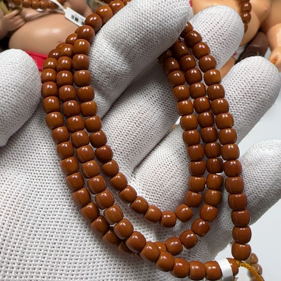 王***艺橄榄核手串/手链老挝核尖脖挂5.6