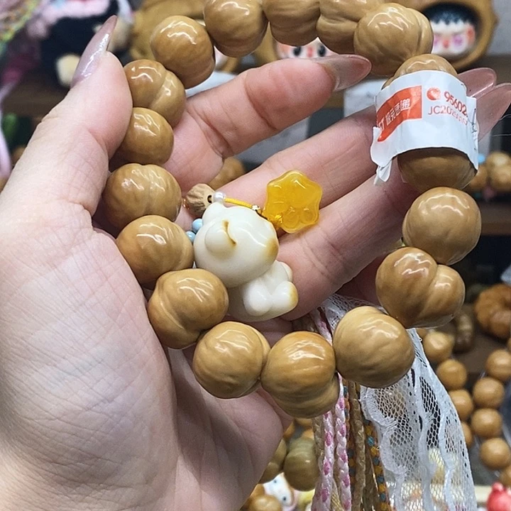 躺***熊猴头核桃吊坠小熊微博 同款流苏