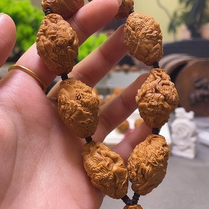 雷***医橄榄核吊坠橄榄核雕