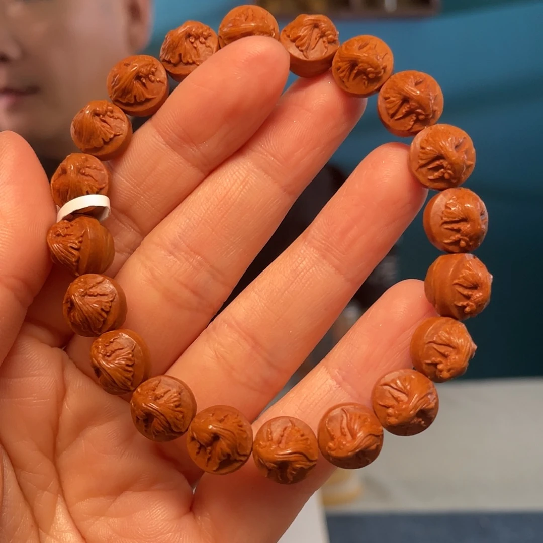 桃核金玉满堂核雕作品