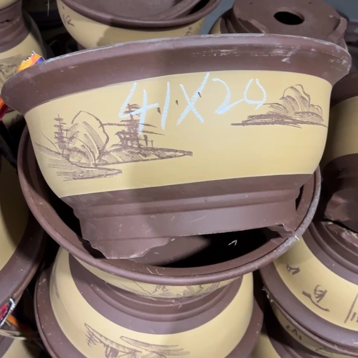 紫砂花盆150-4。  41-20。