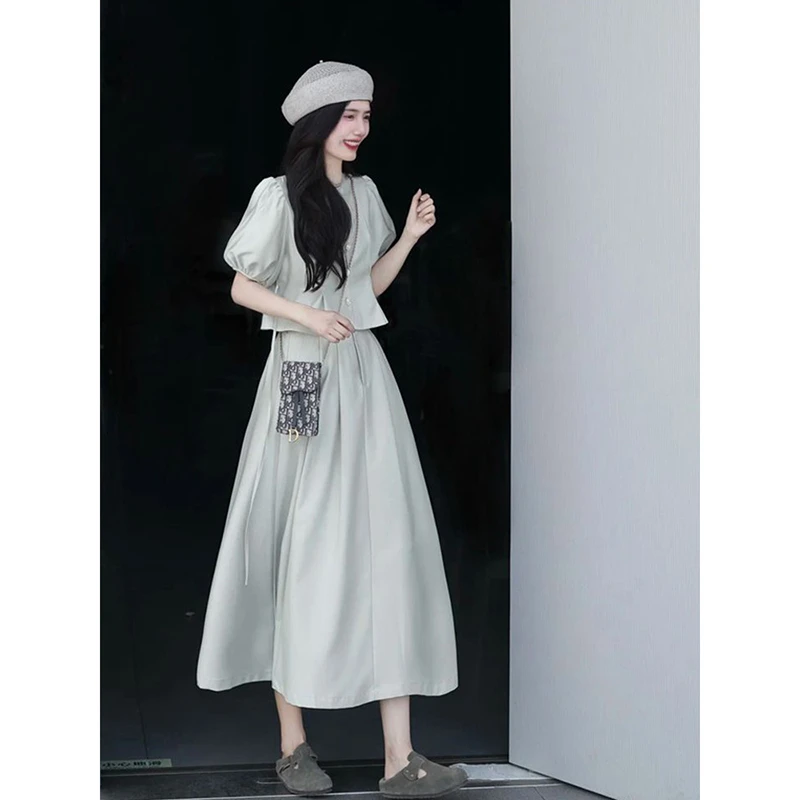 法式气质显瘦套装女2025夏季新款时尚设计泡泡袖上衣半身裙两件套