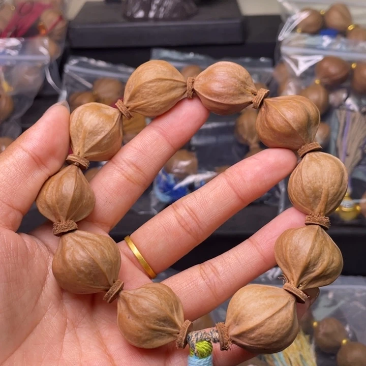 李***强橄榄核手串/手链橄榄核梅林铁2.3四花98