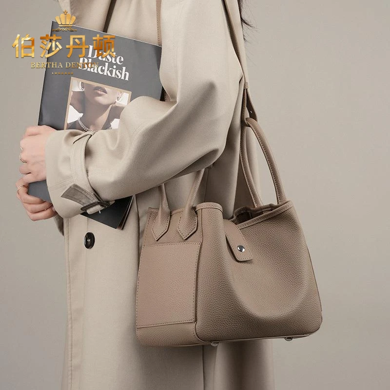 伯莎丹顿通勤单肩斜挎包包小众真皮菜篮子女包休闲百搭手提水桶包