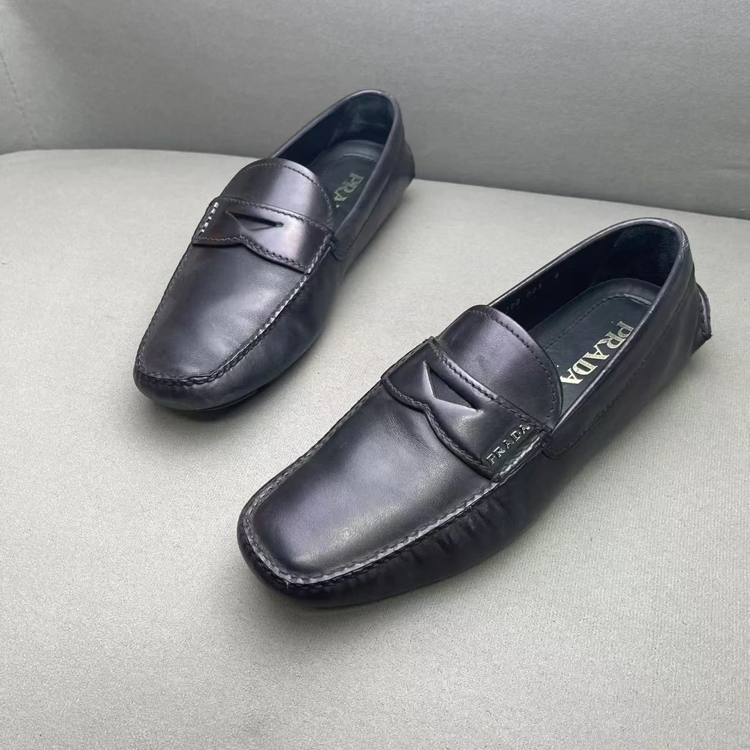 95新 Prada/普拉达 黑色时尚舒适镂空倒三角软底豆豆鞋 40码