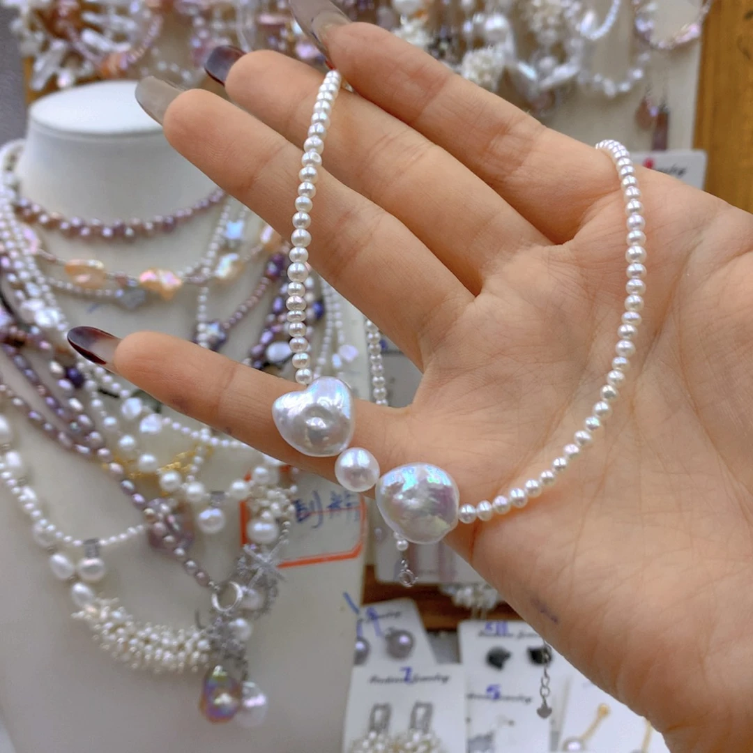 淡水珍珠耳饰银S925镶嵌❥****?