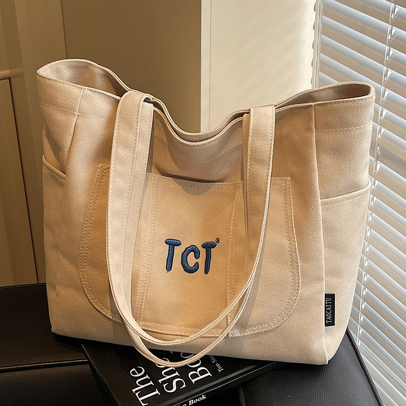 帆布包包女大容量2025新款妈咪手提单肩大学生上课布包通勤托特包