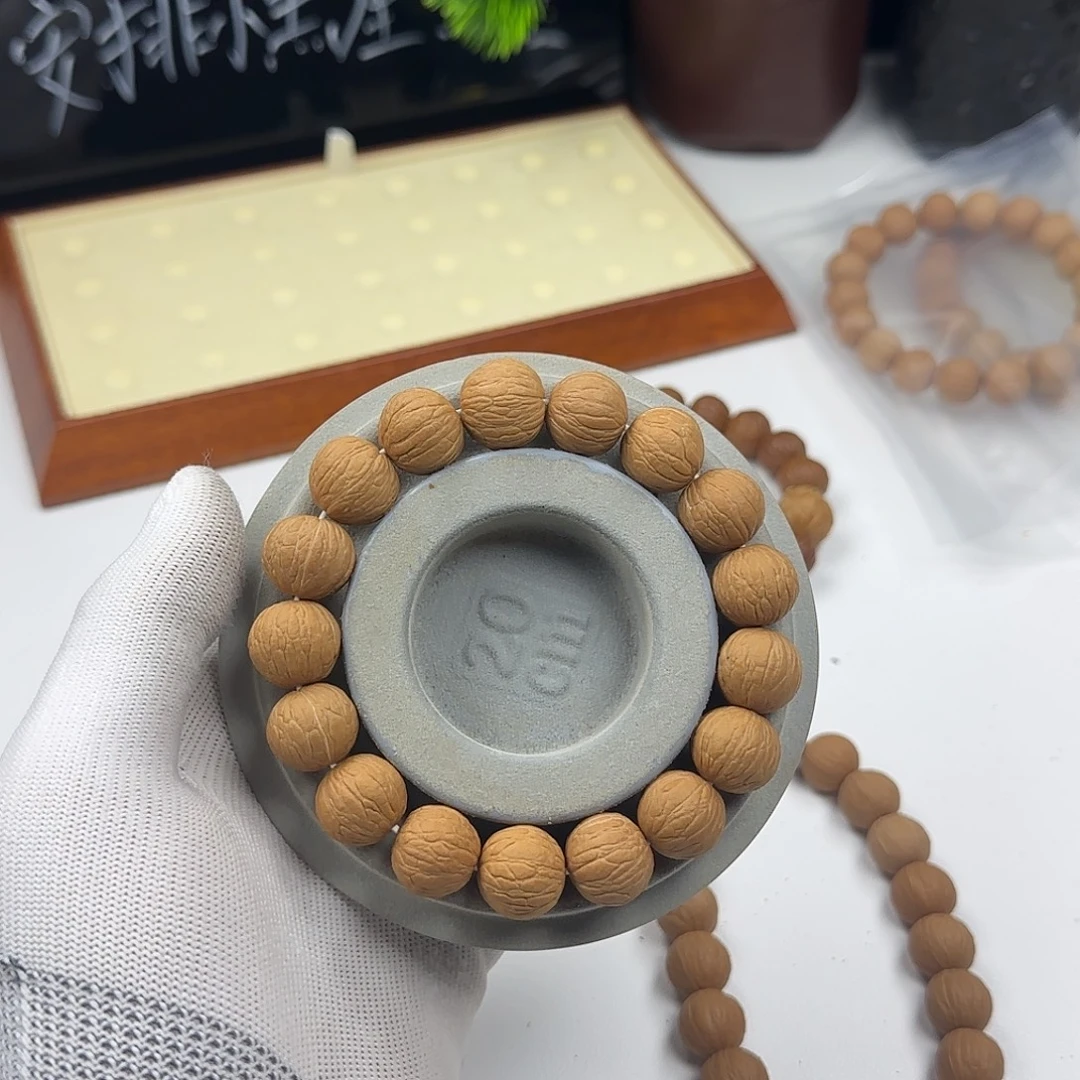 @***》吊坠猴头核桃全品凤羽