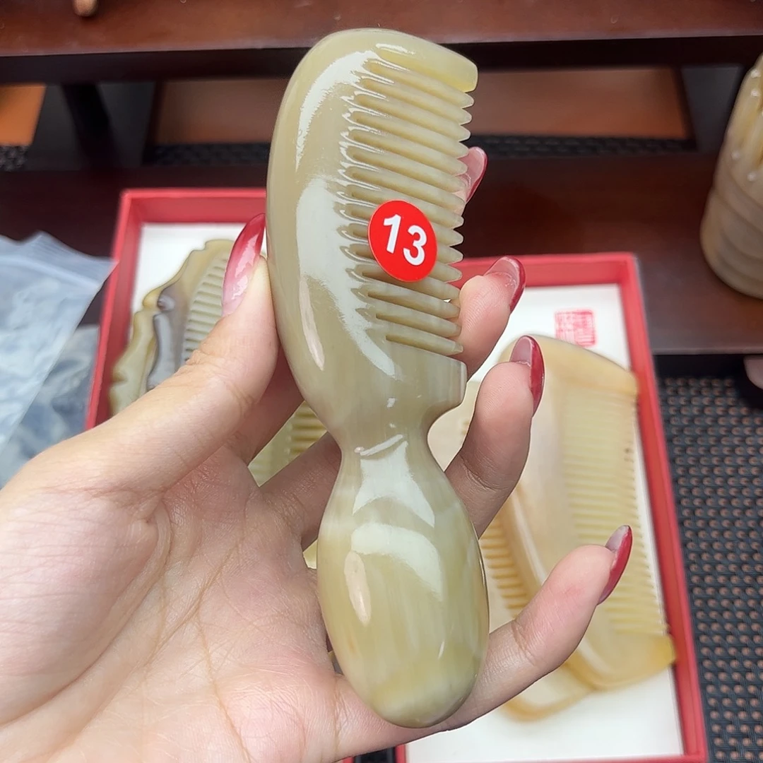 用***7纯手工制作纯牛角梳子