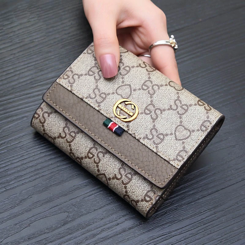 新款欧美酒神小钱包女短款真皮百搭手拿包折叠牛皮女士钱包潮